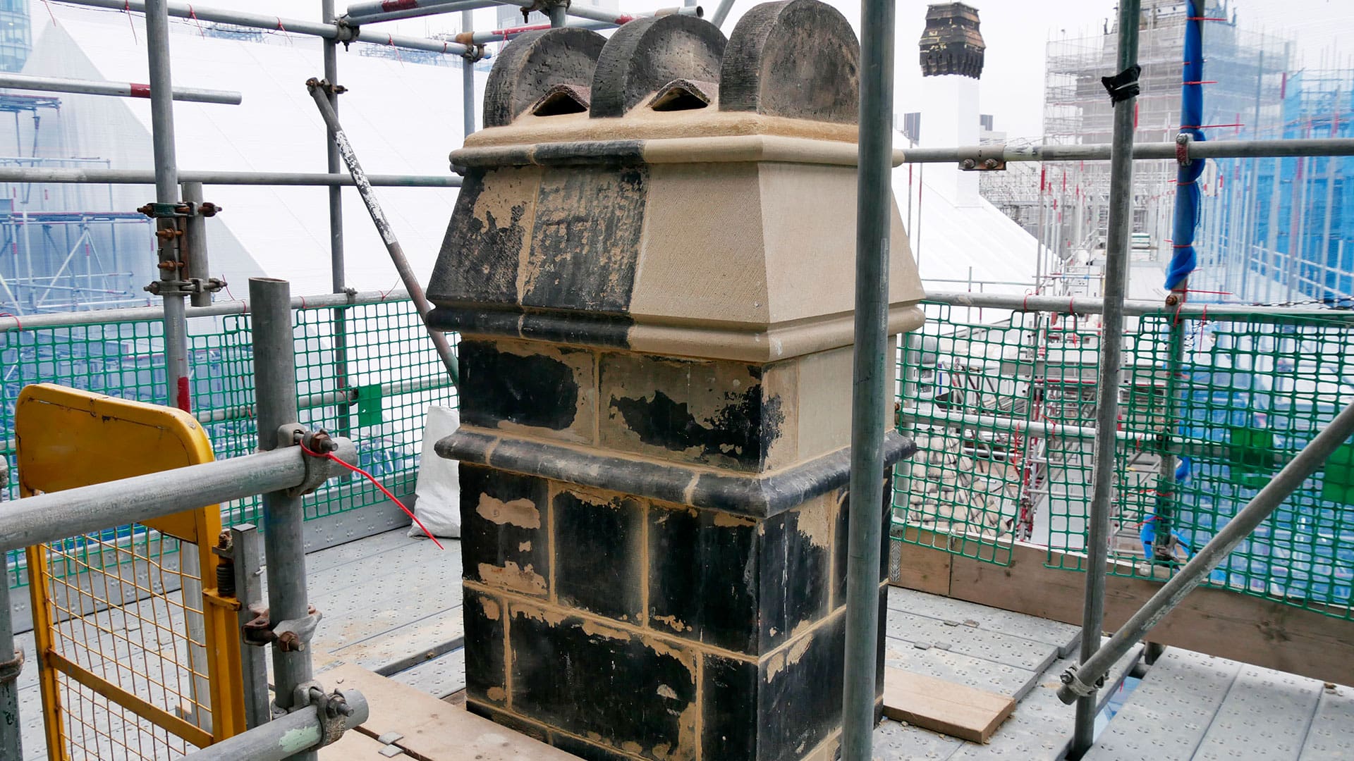 Lyons Stonework team performing detailed restoration and repair on heritage stone structures.
