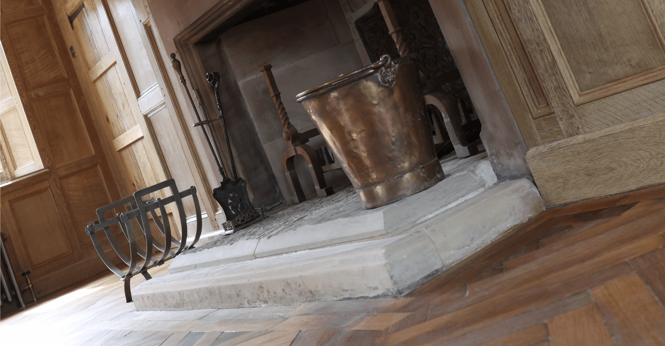 Lyons Stonework creating custom stone fireplaces, combining traditional craftsmanship with modern design.